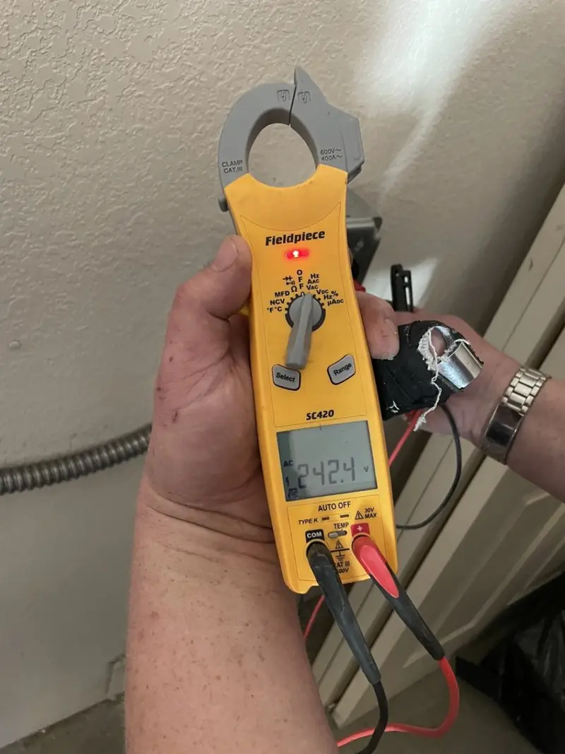 Voltage testing with clamp meter during Aluminum Wiring Replacement in Lyons
